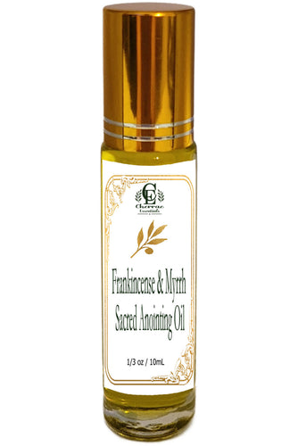 Bottle of Frankincense & Myrrh Sacred Anointing Oil with gold cap on a white background