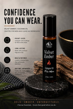 Load image into Gallery viewer, A bottle of Cherrae Essentials Velvet Ember Cologne Oil displayed on a dark stone slab with wood and a bowl in the background, alongside marketing text on the left.
